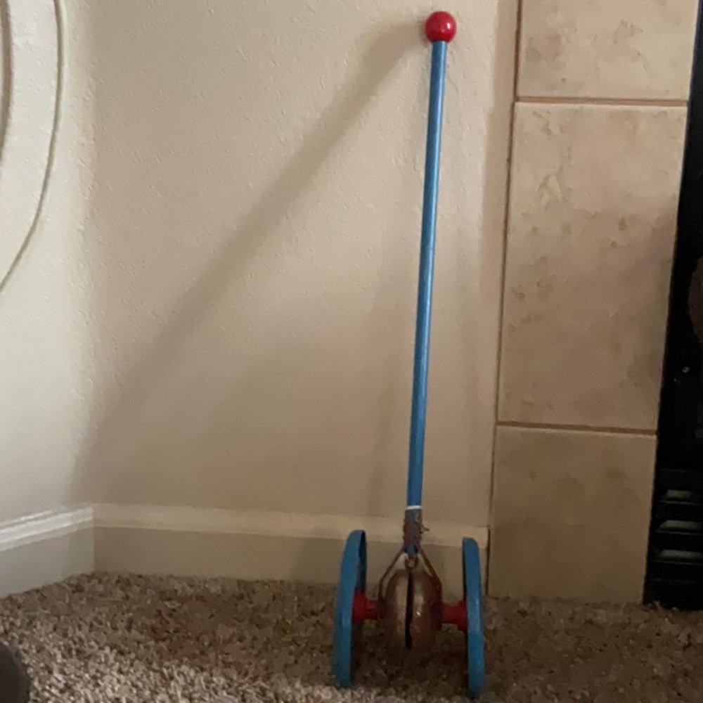 Stick wheel bell toy